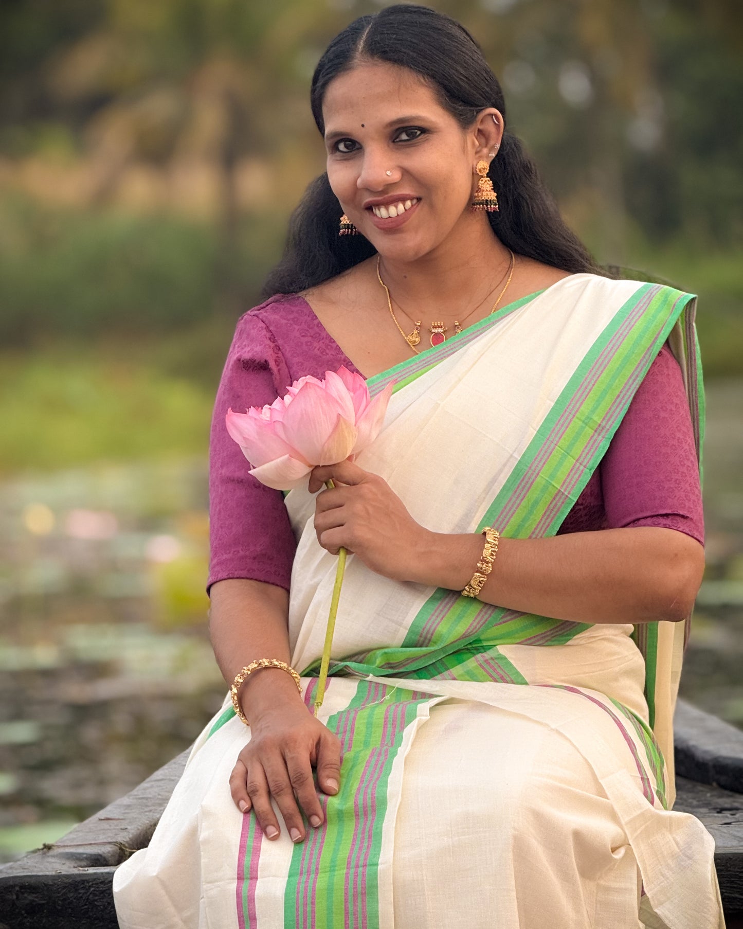 Kerala Set Mundu featuring a refreshing green and pink border