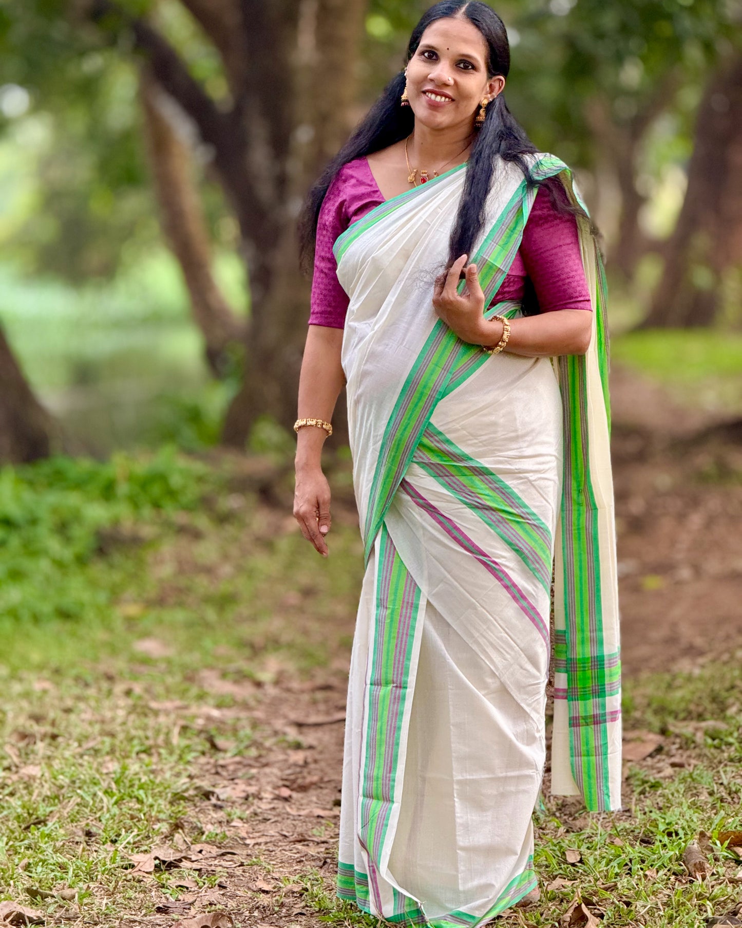 Kerala Set Mundu featuring a refreshing green and pink border