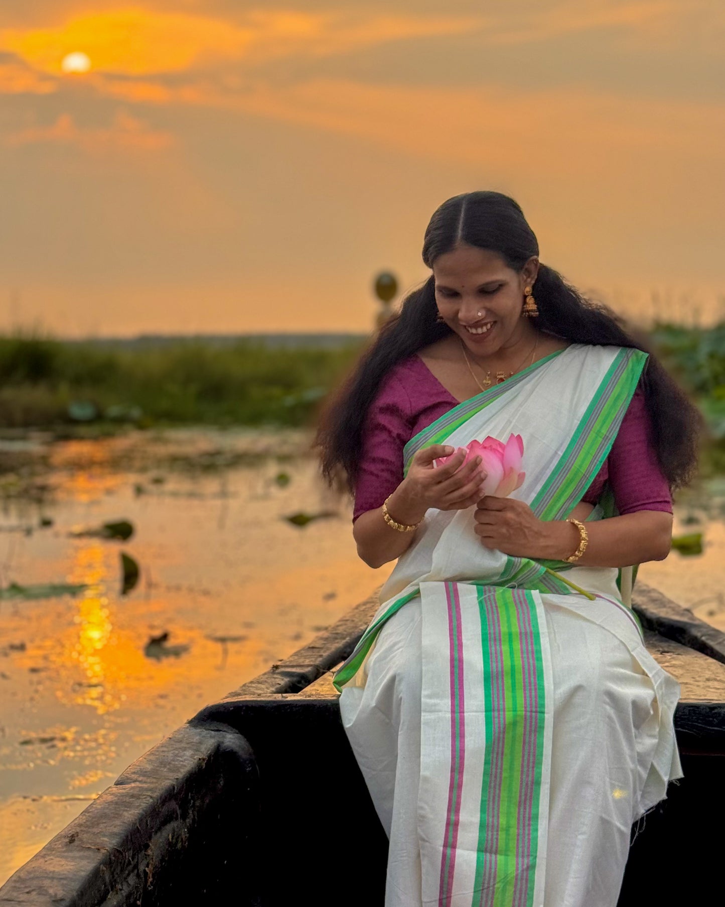 Kerala Set Mundu featuring a refreshing green and pink border