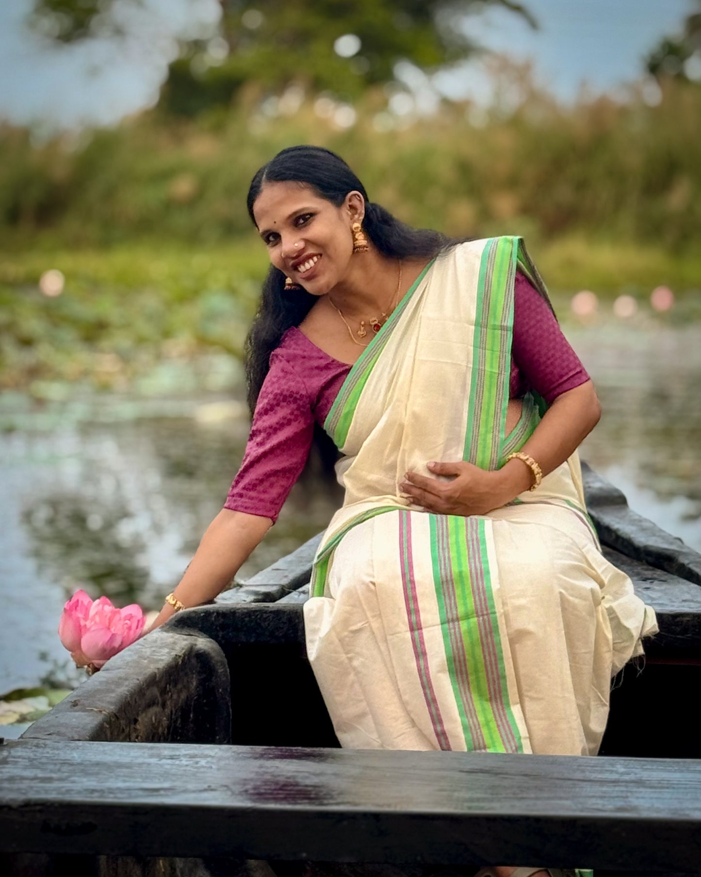 Kerala Set Mundu featuring a refreshing green and pink border
